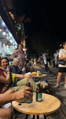 Train passes through crowded Train Street in Hanoi