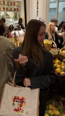 Live band performs at London cocktail event with market displays