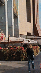 Clock tower square dressed up with elaborate floral displays