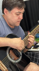 Casual evening moments captured in Korolyov: guitar playing, selfies