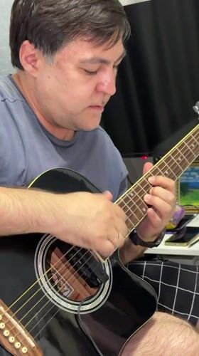 Casual evening moments captured in Korolyov: guitar playing, selfies
