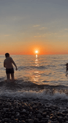 Batumi summer evening: Black Sea sunset, beachside, and city life