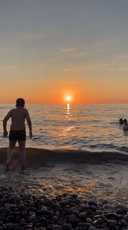 Batumi summer evening: Black Sea sunset, beachside, and city life