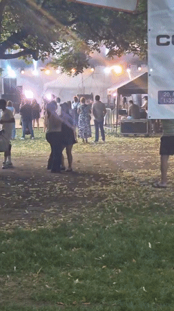 Outdoor festival with stage and crowd in Differdange, Luxembourg