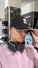 Woman shops for athletic wear at North Kuta store