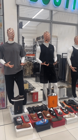 Evening retail activity captured across Abuja storefronts