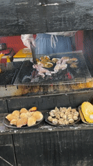 Vietnamese street market showcases grilled seafood and local cuisine