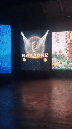 Karaoke night documented in Porlamar venue with food service