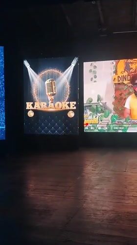 Karaoke night documented in Porlamar venue with food service