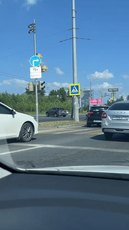 Driving through Kazan streets on sunny afternoon
