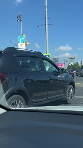 Driving through Kazan streets on sunny afternoon