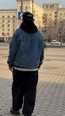 Man walks across brick plaza in Moscow