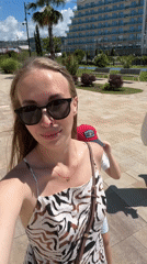 Sunny beach and promenade scene in Sirius, Russia
