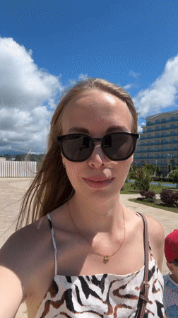 Sunny beach and promenade scene in Sirius, Russia