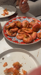 Woman dines on shrimp at Moscow restaurant