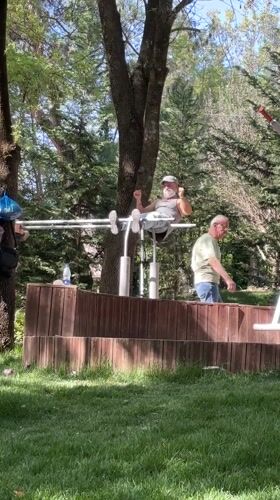 Man exercises in lakeside park in Tirana
