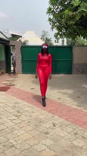Person in red catsuit spotted on Akwanga patio