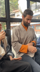 Friends gather for morning coffee at Pokhara lakeside cafe