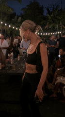 Young adults party at outdoor venue in North Kuta