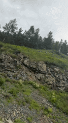 Rocky hillside with prohibition sign filmed in Abaza, Russia