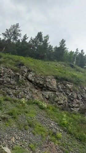Rocky hillside with prohibition sign filmed in Abaza, Russia