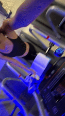 Woman reads book while exercising on treadmill at Mexico City gym