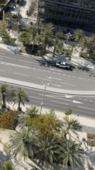 Aerial views document coastal city scenes over seven minutes