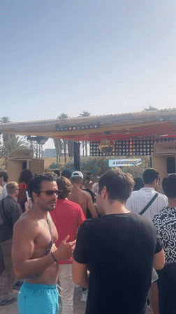 Barceloneta beach buzzing during a summer festival afternoon
