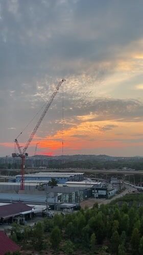 Sunset observed over construction sites in Pattaya City