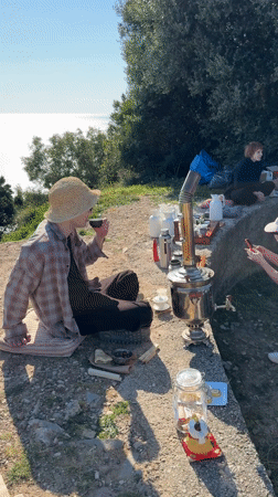 Metal samovar with water droplet observed on Budva oceanfront