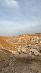 Desert landscape with buildings filmed near Arad, Israel