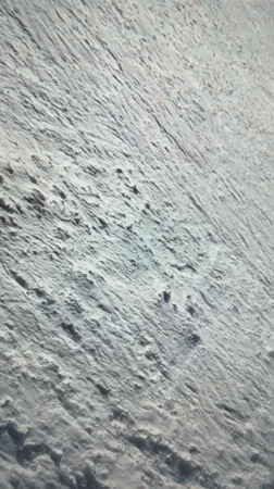 Glacial climbing footage mixed with a stray F1 wing shot
