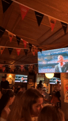 Moscow bar crowd watches soccer match on a Sunday night