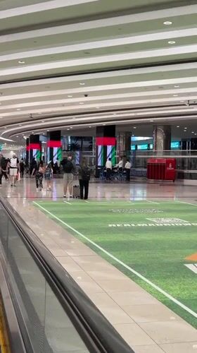 Airport passengers captured on moving walkway in Dubai