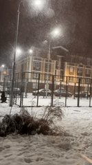 Nighttime snow scene captured in Korolyov residential area