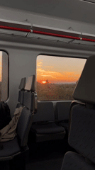 Passenger captures sunset view from empty train in Spain