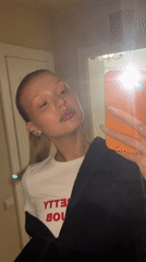 Young woman documents morning routine with dog in Chaikovsky