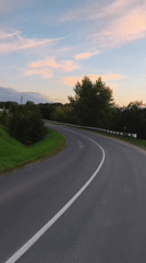 Rural Belarusian road at dusk, seen from ground and air