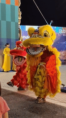 Lion dancers perform at Vuifest Ha Long festival entrance