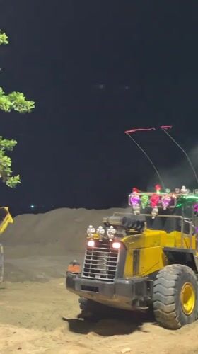 Christmas-lit construction vehicle spotted in Pattaya construction site