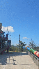 Golden Buddha statue and festival lanterns at Giseong-myeon temple