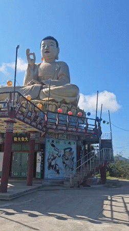 Golden Buddha statue and festival lanterns at Giseong-myeon temple