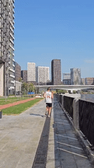Morning activity along Moscow's riverfront embankment