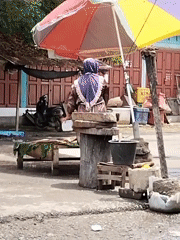 Morning street life captured in Lhokseumawe, Indonesia