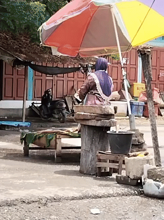 Morning street life captured in Lhokseumawe, Indonesia