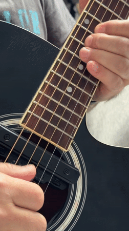 Acoustic guitar performance captured in Mytishchi, Russia