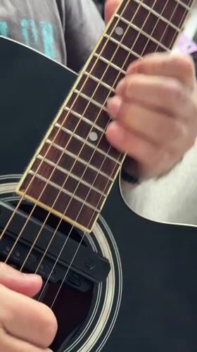 Acoustic guitar performance captured in Mytishchi, Russia