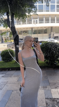 Mirror selfies and street shots on a summer afternoon in Tbilisi