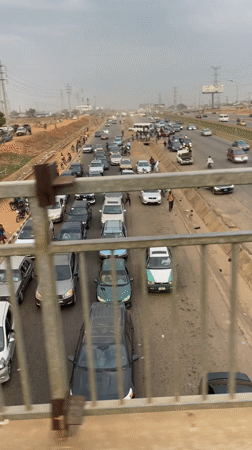 Traffic congestion observed from pedestrian overpass in Abuja