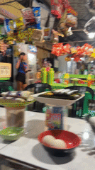 Night food stall in Carmen sells eggs, rice cakes, and snacks